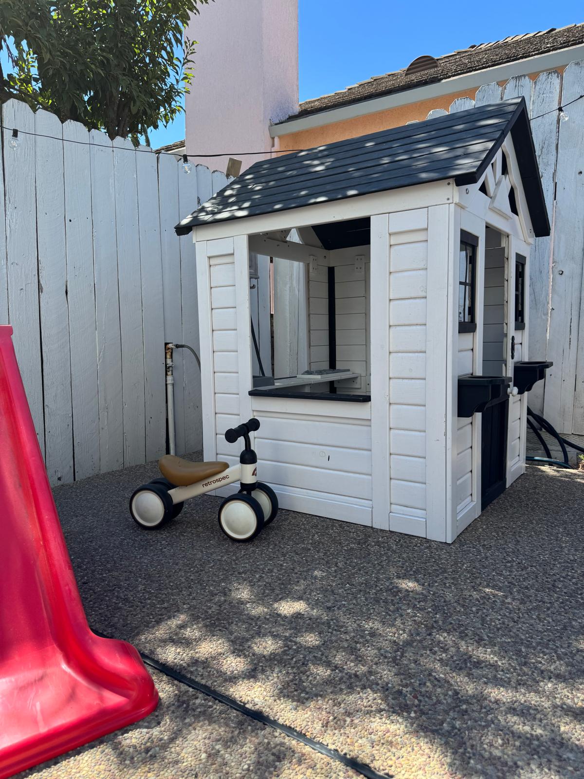 Backyard playhouse, a quiet corner for outdoor imaginative play